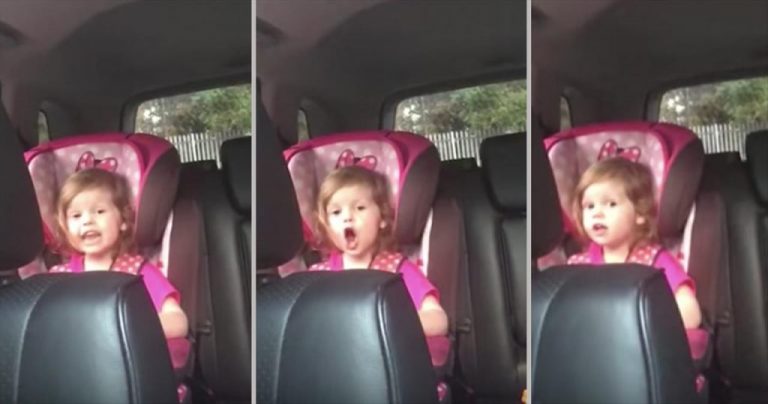 Little Girl Enjoying The Ride Sweetly Sings Bohemian Rhapsody In Her Pink Carseat