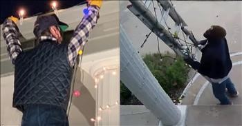 Kind Man Called For Help Seeing Man Hanging From Roof Tangled With Christmas Lights, Discovered He Was Fooled