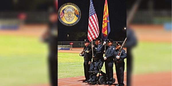 Paralyzed Police Officer Stands And Carries The Flag For National Anthem
