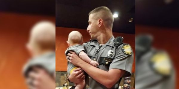 State Trooper Says ‘God put it on my heart’ to Hold a Fussy Baby So Mom Can Eat
