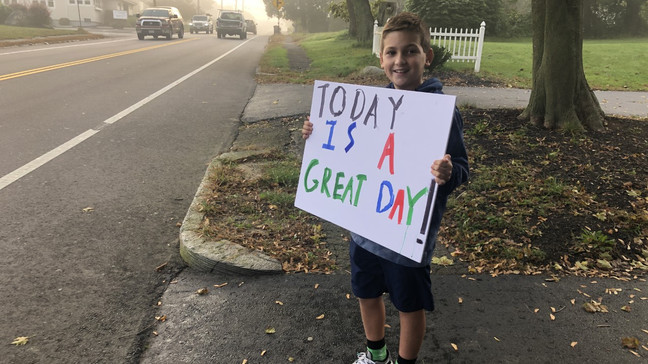 Boy Wakes up Early To Spread Kindness before Bus Stop: ‘I Like to Make People Happy’