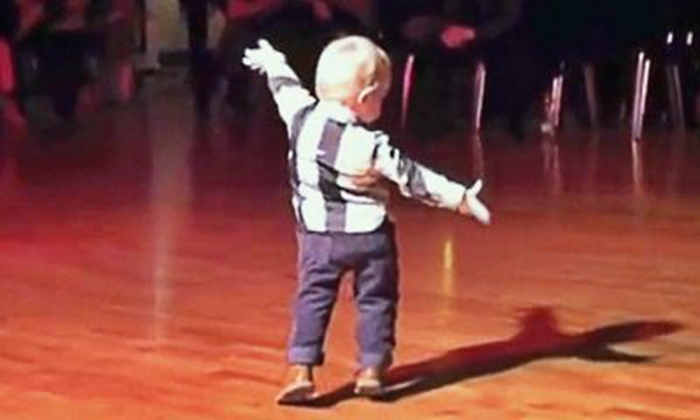 This Toddler Hears Favourite Song, Starts To Dance And Cracks up The Entire Crowd