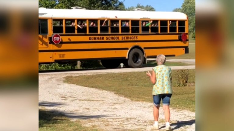 All The Kids on School Bus Cheer for Grandma As Part of Their Daily Routine